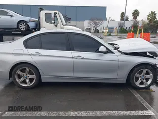 2013 BMW 3 Series 328i with VIN WBA3C1G59DNN93746, listed as a IAAI auction lot 41527720 with 215,442 mi miles and . Bid and sale history available at DreamBid. Image 13.