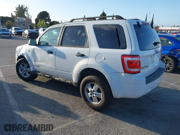 2008 Ford Escape Hybrid with VIN 1FMCU49H78KA37964, listed as a IAAI auction lot 41590572 with 139,830 mi miles and . Bid and sale history available at DreamBid. Image 3.