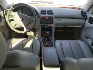 1999 Mercedes-Benz CLK-Class with VIN WDBLJ65G4XF071095, listed as a Copart auction lot 72080064 with 97,558 mi miles and Salvage Title. Bid and sale history available at carsss.com. Image 8.