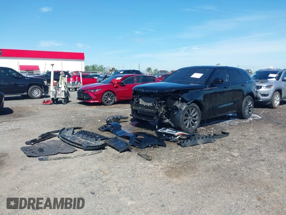 2021 Land Rover Range Rover Velar R-Dynamic S z VIN SALYT2EX8MA298026, wystawiony jako IAAI lot #42005958 z przebiegiem 29 181 mil mil oraz . Historia ofert i sprzedaży dostępna na DreamBid. Obrazek 19.
