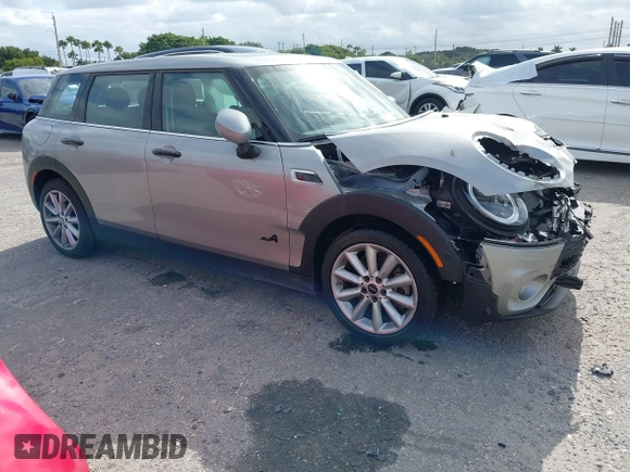 2023 MINI Clubman Cooper S with VIN WMWXJ1C03P2U08484, listed as a IAAI auction lot 41056651 with 12,948 mi miles. Bid and sale history available at carsss.com. Image 1.
