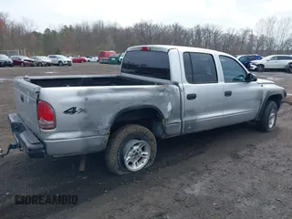 2003 Dodge Dakota Sport with VIN 1D7HG38X13S267227, listed as a IAAI auction lot 41952281 with 119,641 mi miles and . Bid and sale history available at carsss.com. Image 6.