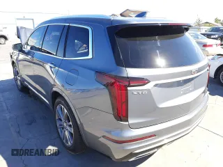 2020 Cadillac XT6 FWD Premium Luxury z VIN 1GYKPERS0LZ126231, wystawiony jako Copart lot #60293642 z przebiegiem 43 187 mil mil oraz . Historia ofert i sprzedaży dostępna na DreamBid. Obrazek 3.