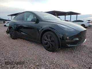 2025 Tesla Model Y Long Range z VIN 7SAYGDED9SF313959, wystawiony jako Copart lot #52823755 z przebiegiem 1 137 mil mil oraz Szkoda całkowita • Salvage title. Historia ofert i sprzedaży dostępna na DreamBid. Obrazek 4.