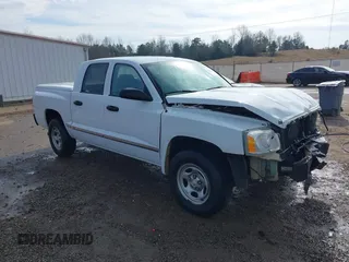 2006 Dodge Dakota ST with VIN 1D7HE28KX6S521235, listed as a IAAI auction lot 41417944 with 122,761 mi miles and . Bid and sale history available at carsss.com. Image 1.
