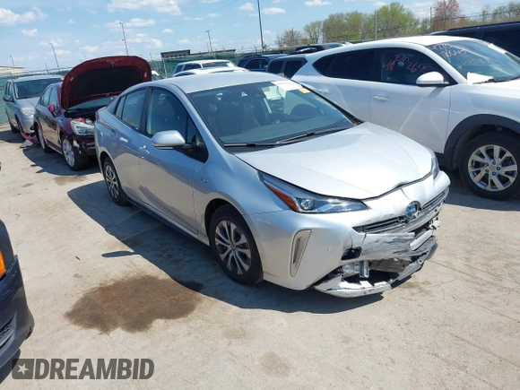 2021 Toyota Prius LE z VIN JTDL9MFU3M3028805, wystawiony jako IAAI lot #42043610 z przebiegiem 26 436 mil mil oraz . Historia ofert i sprzedaży dostępna na DreamBid. Obrazek 1.
