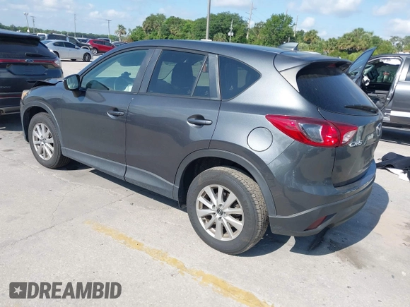 2015 Mazda CX-5 Touring with VIN JM3KE2CY9F0468199, listed as a IAAI auction lot 42099253 with 110,909 mi miles and . Bid and sale history available at carsss.com. Image 3.