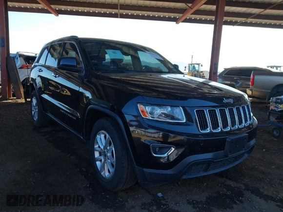 2014 Jeep Grand Cherokee Laredo with VIN 1C4RJEAG3EC472714, listed as a IAAI auction lot 40980100 with 124,603 mi miles. Bid and sale history available at carsss.com. Image 1.