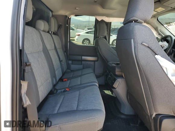 2022 Ford F-150 XL z VIN 1FTFX1E86NKD22373, wystawiony jako Copart lot #69963114 z przebiegiem 96 983 mil mil oraz Szkoda całkowita • Salvage title. Historia ofert i sprzedaży dostępna na DreamBid. Obrazek 10.