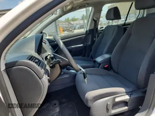 2009 Volkswagen Rabbit S with VIN WVWDB71K79W120196, listed as a Copart auction lot 62126625 with 105,695 mi miles and Salvage title. Bid and sale history available at DreamBid. Image 7.