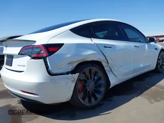 2023 Tesla Model 3 Performance z VIN 5YJ3E1EC7PF432748, wystawiony jako IAAI lot #41841913 z przebiegiem 36 043 mil mil oraz . Historia ofert i sprzedaży dostępna na DreamBid. Obrazek 6.