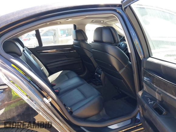 2012 BMW 7 Series 750i with VIN WBAKA8C50CCY37892, listed as a IAAI auction lot 42080313 with 148,058 mi miles. Bid and sale history available at carsss.com. Image 8.