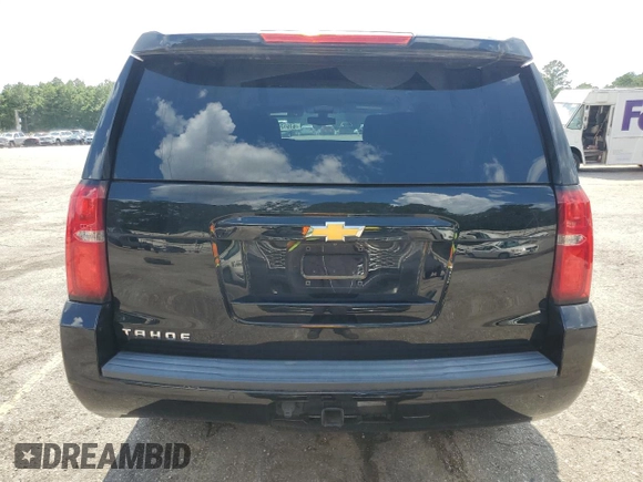 2018 Chevrolet Tahoe LS с VIN 1GNSCAKC0JR213211, выставлен на аукционе Copart как лот 61912895 с пробегом 51 847 миль миль и Списание • Salvage title. История ставок и продаж доступна на DreamBid. Изображение 6.