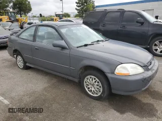 1996 Honda Civic EX z VIN 1HGEJ8146TL091427, wystawiony jako Copart lot #53537235 z przebiegiem 132 490 mil mil oraz Szkoda całkowita • Salvage title. Historia ofert i sprzedaży dostępna na DreamBid. Obrazek 4.