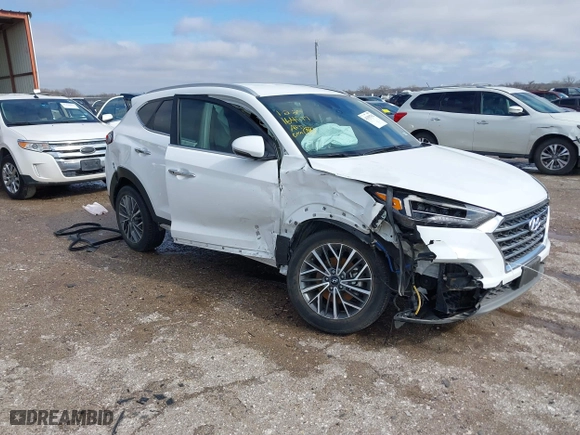 2021 Hyundai Tucson Limited with VIN KM8J33AL5MU410311, listed as a IAAI auction lot 41395702 with 55,562 mi miles. Bid and sale history available at carsss.com. Image 1.