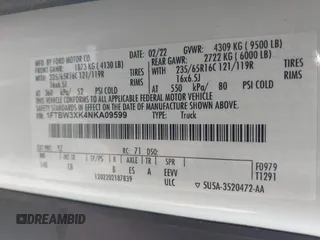 2022 Ford E-Transit Cargo with VIN 1FTBW3XK4NKA09599, listed as a IAAI auction lot 41562551 with 58,035 mi miles. Bid and sale history available at carsss.com. Image 9.