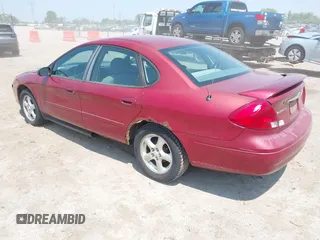 2003 Ford Taurus SE Standard with VIN 1FAFP53UX3G124702, listed as a IAAI auction lot 42463606 with 129,874 mi miles and . Bid and sale history available at DreamBid. Image 3.