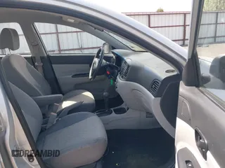 2010 Hyundai Accent GLS with VIN KMHCN4AC1AU476326, listed as a IAAI auction lot 42141297 with 203,607 mi miles. Bid and sale history available at carsss.com. Image 5.