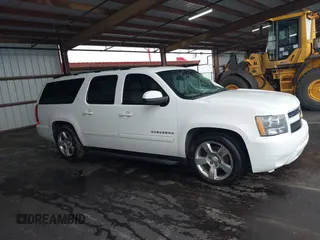 2014 Chevrolet Suburban LT with VIN 1GNSCJE05ER153658, listed as a IAAI auction lot 41867781 with 252,098 mi miles. Bid and sale history available at carsss.com. Image 13.