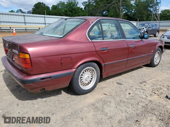 1995 BMW 5 Series 525i z VIN WBAHD632XSGK86387, wystawiony jako Copart lot #58245795 z przebiegiem 168 925 mil mil oraz Czysty tytuł • Clean title. Historia ofert i sprzedaży dostępna na DreamBid. Obrazek 3.