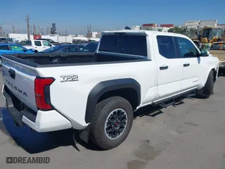 2024 Toyota Tacoma 4WD SR5 with VIN 3TMLB5JN1RM050446, listed as a IAAI auction lot 41658922 with 9,369 mi miles. Bid and sale history available at carsss.com. Image 4.