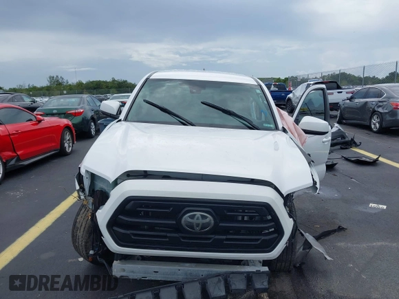 2019 Toyota Tacoma SR с VIN 5TFAX5GN0KX155401, выставлен на аукционе IAAI как лот 42753025 с пробегом 51 913 миль миль и . История ставок и продаж доступна на DreamBid. Изображение 13.