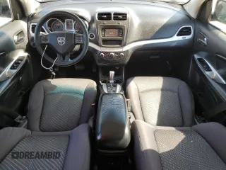 2013 Dodge Journey American Value with VIN 3C4PDCAB1DT715799, listed as a Copart auction lot 52404815 with 185,559 mi miles and Salvage Title. Bid and sale history available at DreamBid. Image 8.