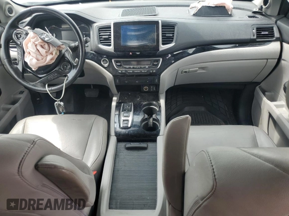 2017 Honda Pilot Touring with VIN 5FNYF6H90HB024321, listed as a Copart auction lot 57459895 with 134,244 mi miles and Salvage title. Bid and sale history available at DreamBid. Image 8.