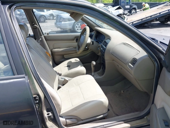 1996 Geo Prizm LSi with VIN 1Y1SK526XTZ026795, listed as a IAAI auction lot 42008701 with 178,017 mi miles. Bid and sale history available at carsss.com. Image 5.