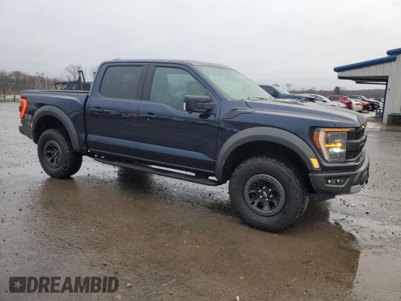 2023 Ford F-150 Raptor with VIN 1FTFW1RG0PFD16861, listed as a Copart auction lot 52928285 with 19,454 mi miles and Salvage Title. Bid and sale history available at DreamBid. Image 4.