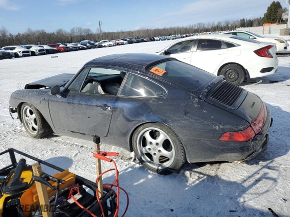 1995 Porsche 911 Carrera with VIN WP0AA299XSS323221, listed as a Copart auction lot 41735125 with 0 mi miles and Salvage Title. Bid and sale history available at carsss.com. Image 2.