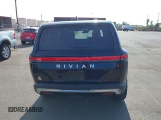 2023 Rivian R1S Adventure z VIN 7PDSGABA8PN020504, wystawiony jako IAAI lot #42025341 z przebiegiem 5989 mil mil oraz . Historia ofert i sprzedaży dostępna na DreamBid. Obrazek 17.