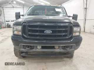 2004 Ford F-350 XL z VIN 1FTSW31P74EB44030, wystawiony jako IAAI lot #42232329 z przebiegiem 141 796 mil mil oraz . Historia ofert i sprzedaży dostępna na DreamBid. Obrazek 12.