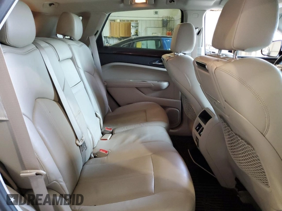 2011 Cadillac SRX Performance Collection with VIN 3GYFNBEY2BS580640, listed as a Copart auction lot 52812555 with 80,547 mi miles and Salvage Title. Bid and sale history available at carsss.com. Image 11.