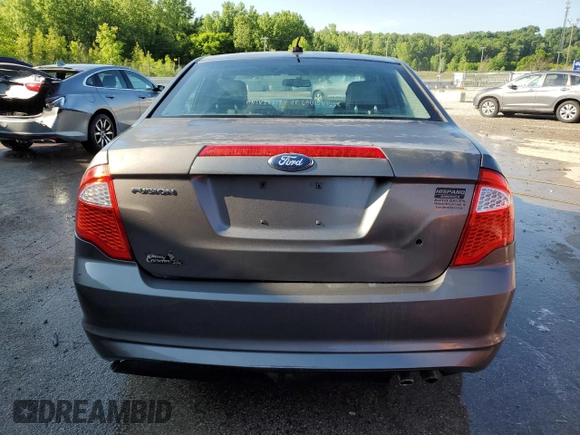 2012 Ford Fusion SE z VIN 3FAHP0HA0CR437115, wystawiony jako Copart lot #56583495 z przebiegiem 159 649 mil mil oraz Szkoda całkowita • Salvage title. Historia ofert i sprzedaży dostępna na DreamBid. Obrazek 6.