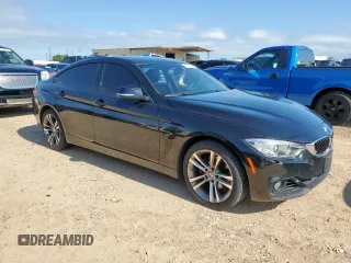 2015 BMW 4 Series 428i xDrive with VIN WBA4C9C58FG135373, listed as a Copart auction lot 58545155 with 122,732 mi miles and Salvage title. Bid and sale history available at DreamBid. Image 4.