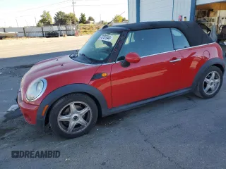 2009 MINI Convertible z VIN WMWMR33579TU96438, wystawiony jako Copart lot #73787644 z przebiegiem 124 408 mil mil oraz Szkoda całkowita • Salvage title. Historia ofert i sprzedaży dostępna na DreamBid. Obrazek 1.