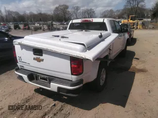 2019 Chevrolet Colorado 2WD Work Truck with VIN 1GCHSBEN7K1118301, listed as a IAAI auction lot 41839738 with 57,095 mi miles and . Bid and sale history available at DreamBid. Image 4.