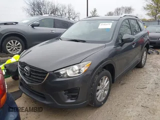 2016 Mazda CX-5 Sport with VIN JM3KE4BY5G0885754, listed as a IAAI auction lot 41103575 with 136,263 mi miles and . Bid and sale history available at carsss.com. Image 18.