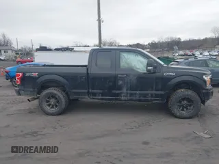 2019 Ford F-150 XL with VIN 1FTFX1E57KKF17710, listed as a IAAI auction lot 41229931 with 131,543 mi miles and . Bid and sale history available at DreamBid. Image 13.