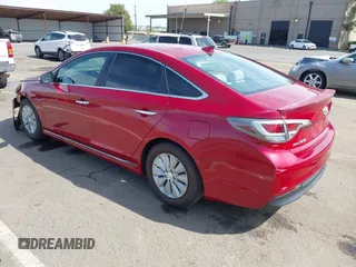 2016 Hyundai Sonata Hybrid SE with VIN KMHE24L18GA026079, listed as a IAAI auction lot 42051741 with 116,076 mi miles. Bid and sale history available at carsss.com. Image 3.