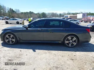 2016 BMW 7 Series 740i with VIN WBA7E2C54GG714649, listed as a IAAI auction lot 41815220 with 89,029 mi miles. Bid and sale history available at carsss.com. Image 14.