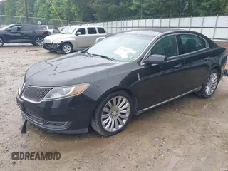 2014 Lincoln MKS z VIN 1LNHL9DK0EG610145, wystawiony jako IAAI lot #42348345 z przebiegiem 61 289 mil mil oraz . Historia ofert i sprzedaży dostępna na DreamBid. Obrazek 18.