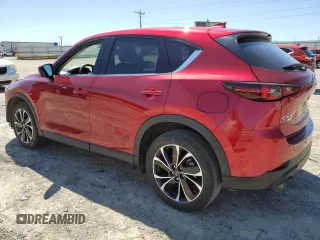 2023 Mazda CX-5 2.5 S Premium Plus Package with VIN JM3KFBEM0P0163618, listed as a Copart auction lot 52410185 with 31,909 mi miles and Salvage Title. Bid and sale history available at carsss.com. Image 2.