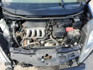 2013 Honda Fit Sport z VIN JHMGE8H68DC053863, wystawiony jako Copart lot #52140945 z przebiegiem Nie podano mil oraz Szkoda całkowita • Salvage title. Historia ofert i sprzedaży dostępna na DreamBid. Obrazek 11.
