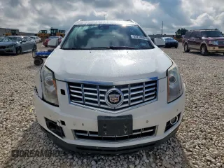 2014 Cadillac SRX Performance Collection with VIN 3GYFNCE39ES687733, listed as a Copart auction lot 62770665 with 151,714 mi miles and Salvage title. Bid and sale history available at DreamBid. Image 5.
