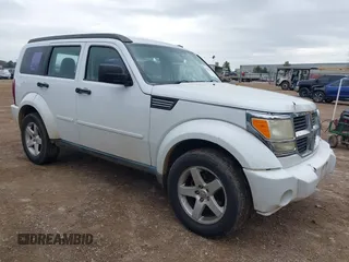 2011 Dodge Nitro SE z VIN 1D4PT2GK5BW590062, wystawiony jako IAAI lot #41611402 z przebiegiem 247 207 mil mil oraz . Historia ofert i sprzedaży dostępna na DreamBid. Obrazek 1.