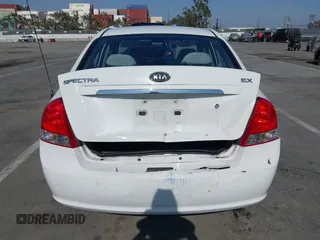 2009 Kia Spectra LX z VIN KNAFE222995623894, wystawiony jako IAAI lot #42385181 z przebiegiem 119 030 mil mil oraz . Historia ofert i sprzedaży dostępna na DreamBid. Obrazek 16.