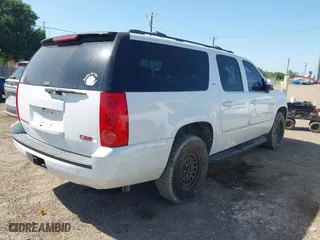 2009 GMC Yukon XL SLT w/4SB with VIN 1GKFC36J49R210309, listed as a IAAI auction lot 42025315 with 236,004 mi miles. Bid and sale history available at carsss.com. Image 4.
