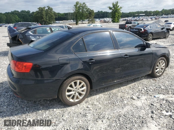 2012 Volkswagen Jetta SE with VIN 3VWDX7AJ3CM114196, listed as a Copart auction lot 61236545 with 128,893 mi miles and Salvage title. Bid and sale history available at DreamBid. Image 3.